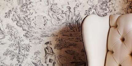 Colonial themed wallpaper celebrates the area's historical culture